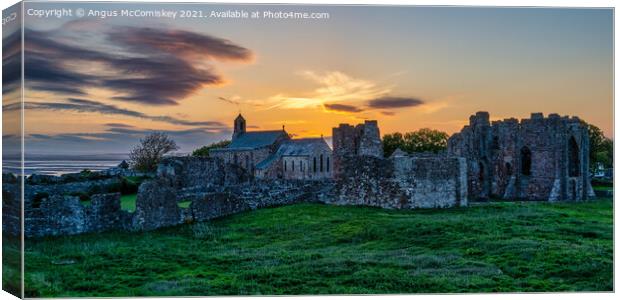 Lindisfarne Priory sunset Canvas Print by Angus McComiskey