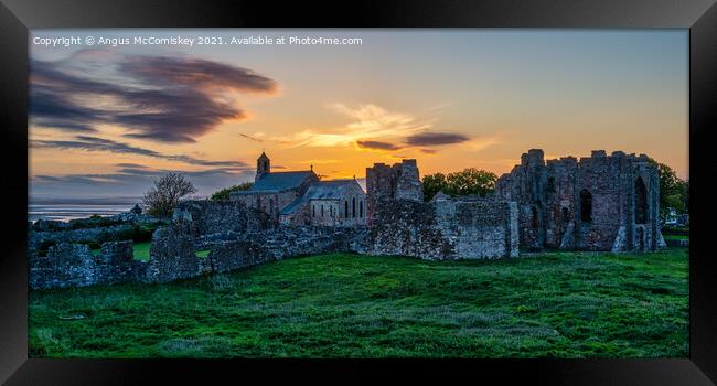 Lindisfarne Priory sunset Framed Print by Angus McComiskey