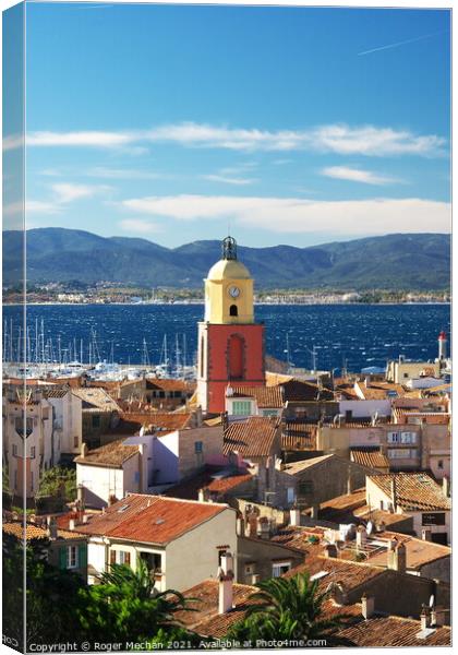St Tropez's Red Roofs and Colourful Church Canvas Print by Roger Mechan