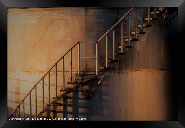 Golden glow on metal stairs outside an industrial  Framed Print by Errol D'Souza