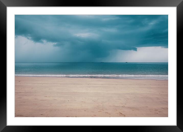 Unsettled dark sky over the beach in Brittany Framed Mounted Print by Laurent Renault