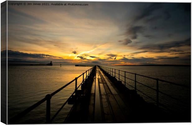 Sunrise over the Old Wooden Pier at Blyth (2) Canvas Print by Jim Jones