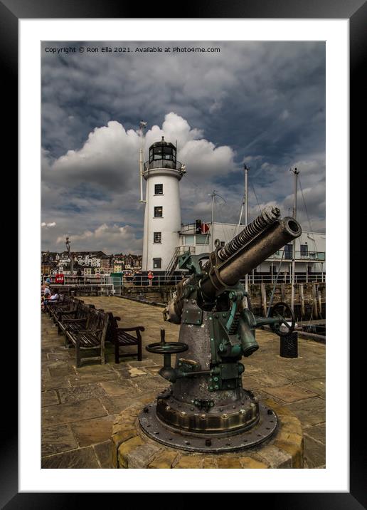 Scarborough Harbour Lighthouse and Gun Framed Mounted Print by Ron Ella