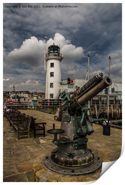 Scarborough Harbour Lighthouse and Gun Print by Ron Ella