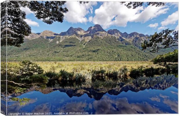 Reflections of Fjordland Canvas Print by Roger Mechan