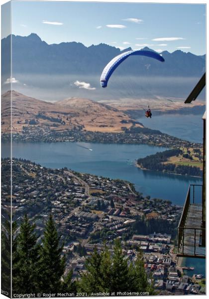 Soaring over Queenstown Canvas Print by Roger Mechan