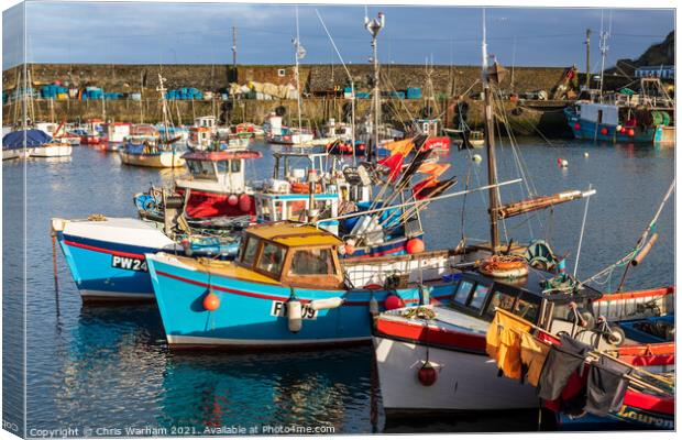 Fishing boats in Mevagissey Harbour Canvas Print by Chris Warham