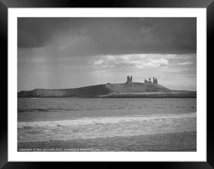 Rain and Dunstanburgh Framed Mounted Print by Alan Dunnett