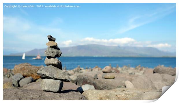 Stacked stones at the coastline of Reykjavik, Iceland Print by Lensw0rld 