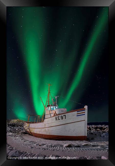 Northern lights over fishing boat Framed Print by Giles Rocholl