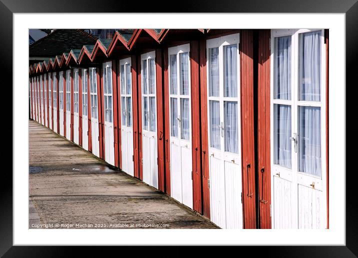 Cheerful Huts by the Seashore Framed Mounted Print by Roger Mechan