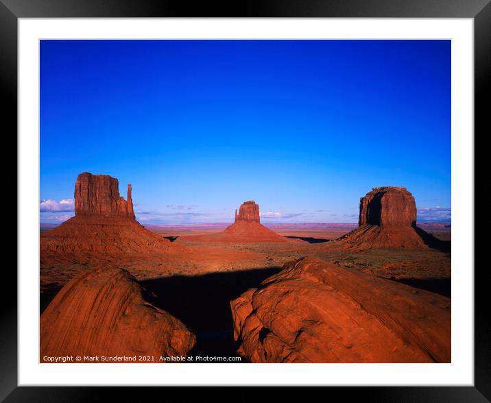 The Mittens and Merrick Butte at Sunset Monument Valley Framed Mounted Print by Mark Sunderland