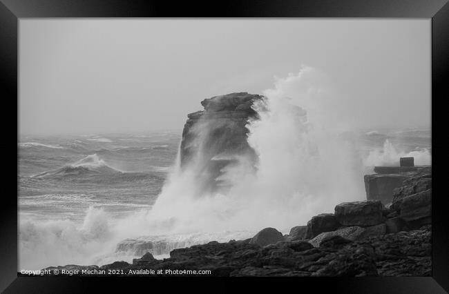 Pulpit Rock's Battle with the Storm Framed Print by Roger Mechan