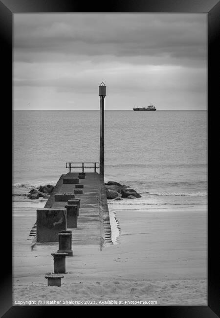 Mablethorpe breakwater and ship Framed Print by Heather Sheldrick