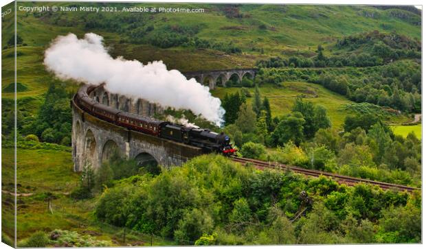 The Jacobite steam train passes over the Glenfin Canvas Print by Navin Mistry