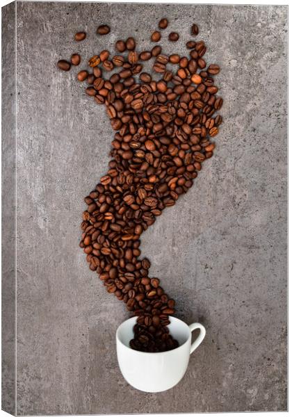 Spilled cup of coffee with beans as smoke shape Canvas Print by Laurent Renault