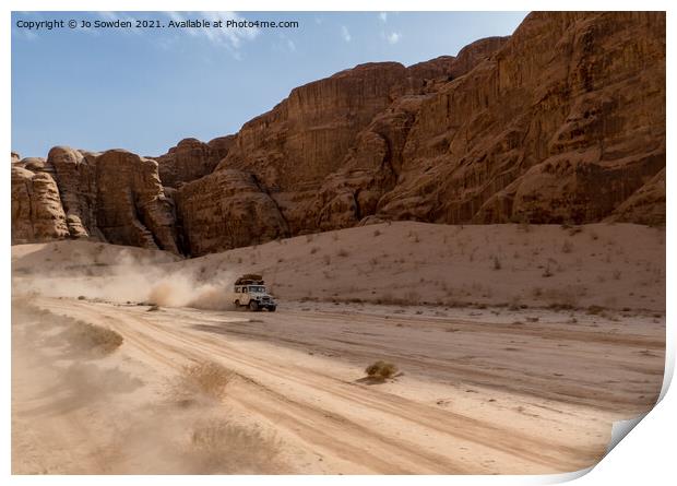 Jeep speeding through Wadi Rum, Jordan Print by Jo Sowden