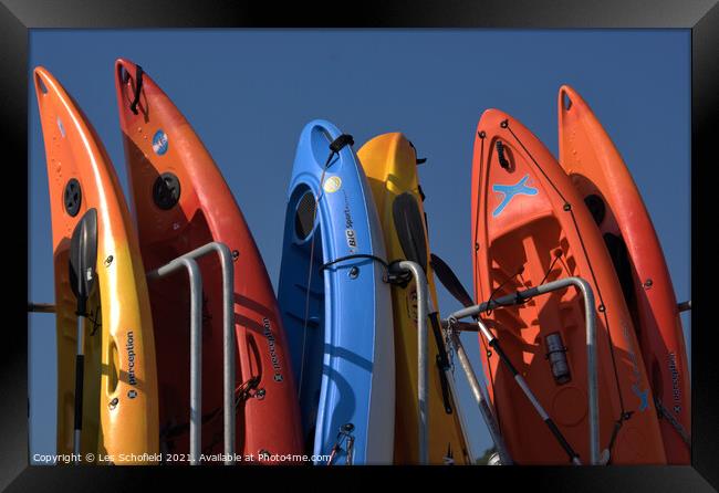Kayaks  Framed Print by Les Schofield
