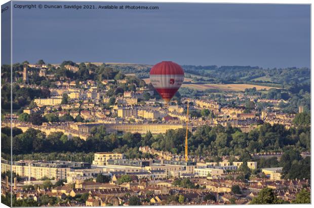 Hot air balloon passes Bath's famous Royal Crescent  Canvas Print by Duncan Savidge