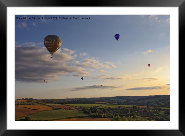 Hot air balloons over Englishcombe village  Framed Mounted Print by Duncan Savidge