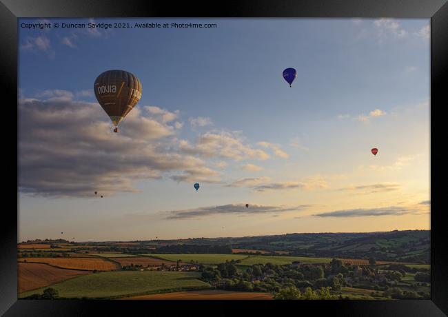 Hot air balloons over Englishcombe village  Framed Print by Duncan Savidge