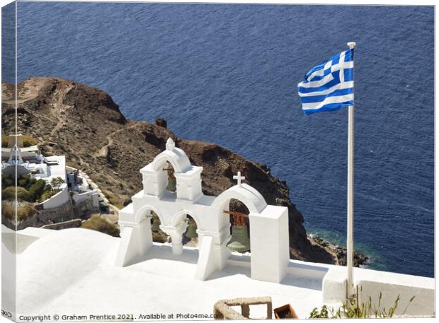 Santorini Bell Tower and Greek Flag Canvas Print by Graham Prentice