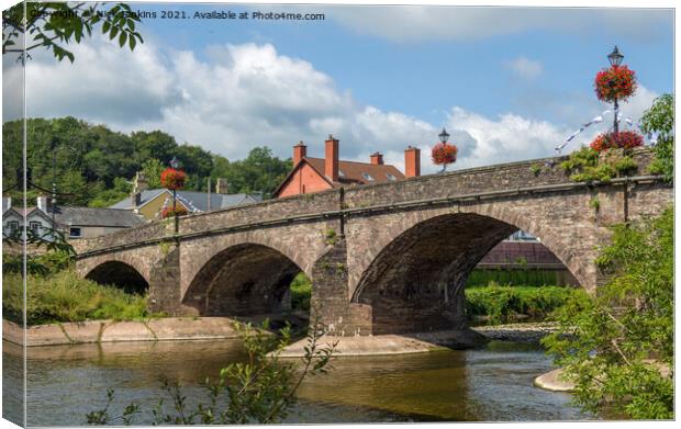 Arched Bridge Over River Usk at Usk  Canvas Print by Nick Jenkins