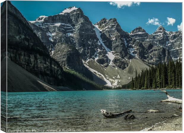 Serene Reflections: Moraine Lake in Banff National Canvas Print by Ron Ella