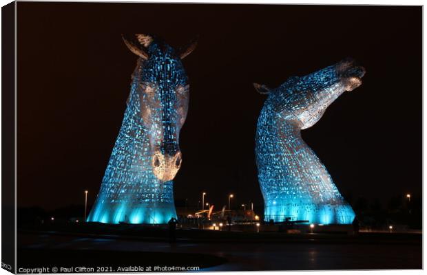 The Kelpies in blue. Canvas Print by Paul Clifton