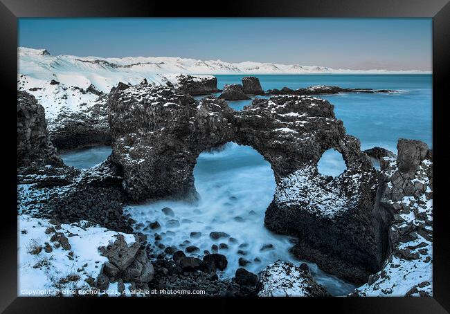 Blue rock arch seascape Iceland Framed Print by Giles Rocholl