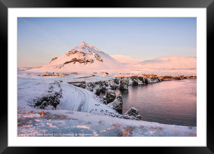Snowy mountain village Iceland Framed Mounted Print by Giles Rocholl