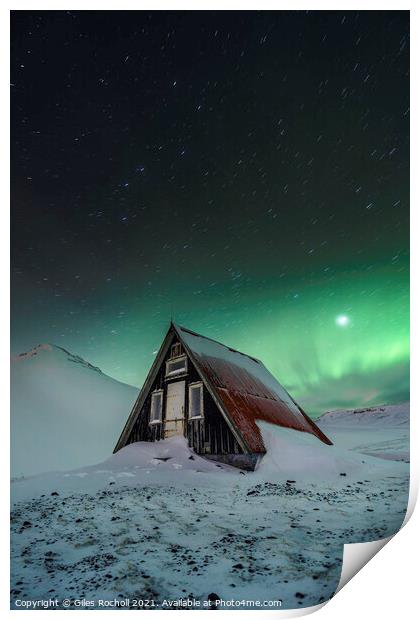 Snowy cabin and northern lights Print by Giles Rocholl