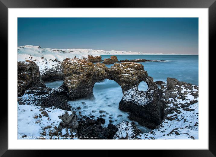Snowy sea arch Iceland Framed Mounted Print by Giles Rocholl