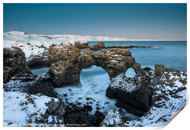 Snowy sea arch Iceland Print by Giles Rocholl