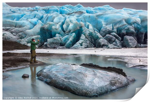 Photographer exploring Iceland Print by Giles Rocholl