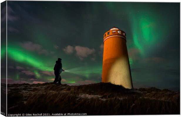 Exploring night time Iceland light house Canvas Print by Giles Rocholl