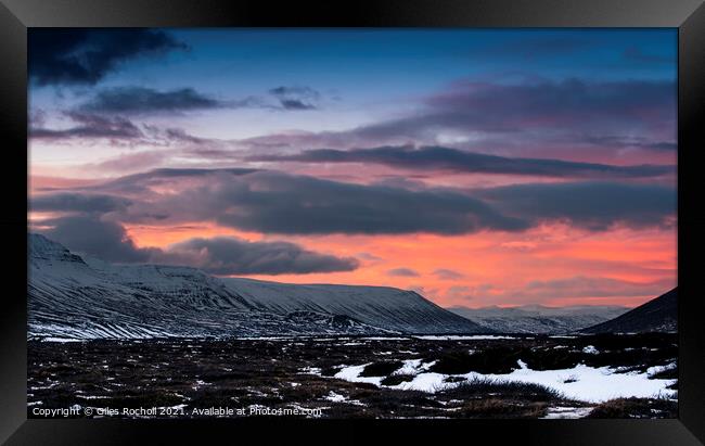 Iceland sunset and snowy mountains Framed Print by Giles Rocholl
