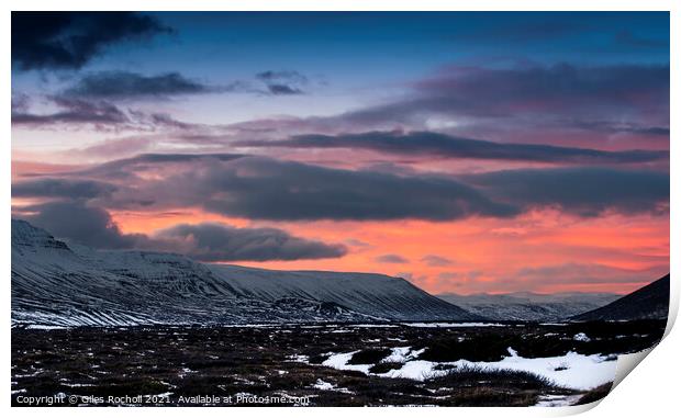 Iceland sunset and snowy mountains Print by Giles Rocholl