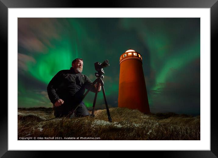 Photographer light house and northern lights Iceland Framed Mounted Print by Giles Rocholl