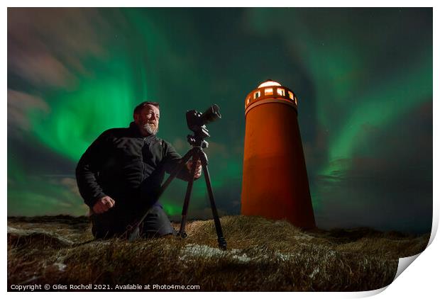 Photographer light house and northern lights Iceland Print by Giles Rocholl