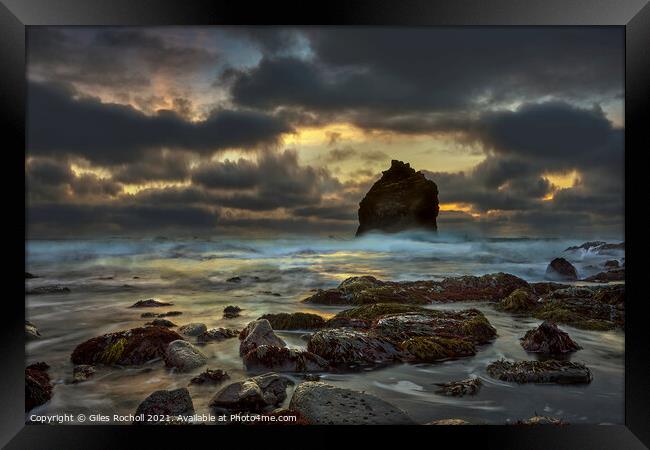 Sea stack sunset storm Iceland Framed Print by Giles Rocholl