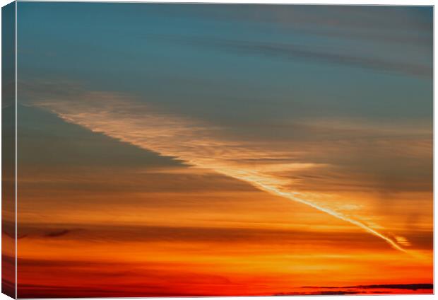 Contrail at sunset Canvas Print by Rory Hailes