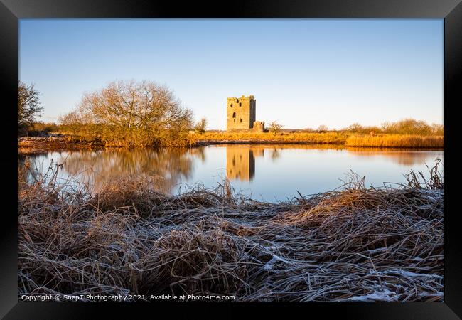 Long exposure of Threave Castle reflecting on the River Dee in t Framed Print by SnapT Photography