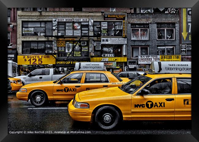 Yellow taxi cabs New York Framed Print by Giles Rocholl