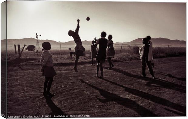 Children playing ball South Africa Canvas Print by Giles Rocholl