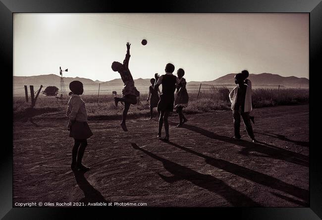 Children playing ball South Africa Framed Print by Giles Rocholl