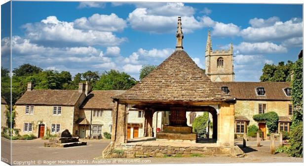 The Charming Market Cross of Castle Combe Canvas Print by Roger Mechan