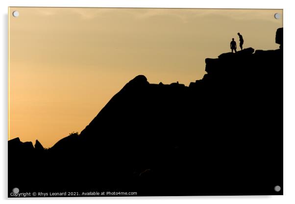 Two rock climbers look back from the summit of stanage edge in england Acrylic by Rhys Leonard