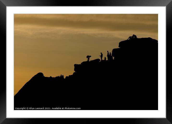 Dusky sunset peak district scene. People line the top of stanage edge Framed Mounted Print by Rhys Leonard