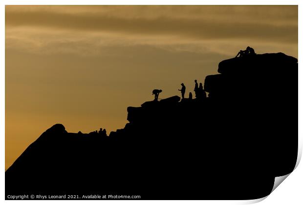 Dusky sunset peak district scene. People line the top of stanage edge Print by Rhys Leonard